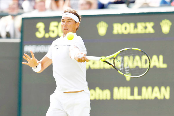 Nadal y Murray debutan en Wimbledon sin problemas